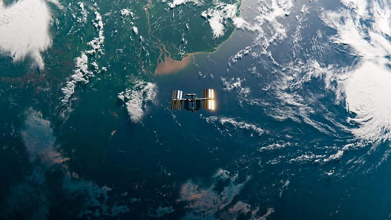 Satellite flies over the planet