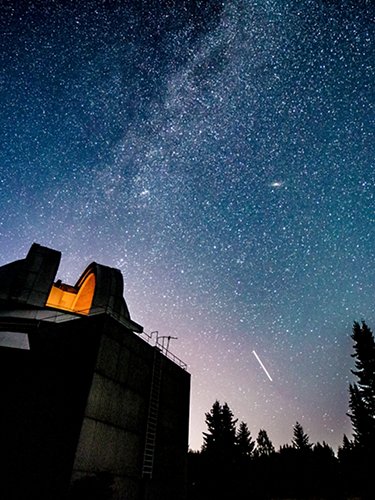 Observatory and starry sky